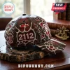 Glossy maroon baseball cap with silver metallic web accents, embossed 2112 text, and star emblem on a wood base.!
