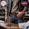 Rush 2112 Starman metal belt buckle worn on a black leather belt against blue jeans, leather jacket, and music studio.!
