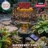 Rush band solar garden light featuring miniature band members, stage, and a 58th anniversary plaque on a stone-like base.!