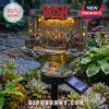 Rush band solar garden light featuring miniature band members, stage lights, and a 58th Anniversary plaque on a stone base.!
