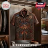 Short-sleeve button-down shirt featuring embossed Rush band iconography, a central Starman, and intricate metallic patterns.!