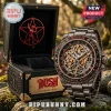 Rush Clockwork Angels men's skeleton watch with gold star gear, silver Starman figure, and black display box on mossy rock.!