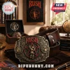Rush band belt buckle featuring Starman logo, guitar, and drum kit icons on aged metal with a brown leather belt strap.!