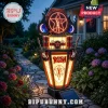 Rush band themed solar garden lamp with Starman logo, miniature drum kit, and electric guitars in a landscaped garden.!