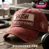 Distressed maroon baseball cap featuring a Rush The Spirit of Radio patch and Starman logo embroidery on a wooden table.!
