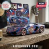 Diecast Lamborghini model car with Rush band branding and cosmic blue and red patterns on a wooden surface.!