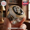 San Antonio Spurs championship ring with black stone, gold accents, and silver detailing held in a hand.!