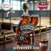 San Antonio Spurs branded whiskey bottle with a basketball topper, championship logo, and matching engraved glass.!