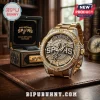 San Antonio Spurs gold chronograph watch with crystal bezel and display case on a brown leather mat.!