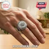 Silver San Antonio Spurs championship style ring with clear faceted stone worn on a finger against a wooden background.!