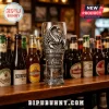 Scorpions band commemorative glass featuring a scorpion emblem and 1965-2026 61 years of rock legends text on a bar counter.!