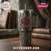 Slayer band themed metal stainless steel tumbler with eagle emblem, pentagram, and album titles on a wooden table.!