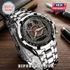 Slayer band themed stainless steel chronograph watch with eagle logo on a dark background.!