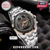 Slayer band themed stainless steel analog watch featuring an eagle emblem and red logo on a black dial with tachymeter bezel.!