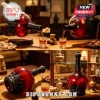 Deep red glass whiskey decanter featuring intricate black filigree metal detailing and a matching ornate bottle stopper.!