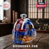 Space marine helmet shaped glass whiskey decanter with blue, red, and gold accents, featuring a chrome skull emblem.!
