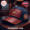 Spider-Man navy and maroon baseball cap with gold logo, embroidered text, and metallic side patch on a wooden surface.!
