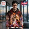 Man wearing a Star Trek 60th anniversary hoodie with galaxy print and cast portraits on a black and red background.!