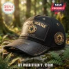 Black baseball cap featuring gold Star Wars Galactic Empire logo, Est. 1977 text, and custom name panel on a mossy rock.!