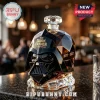Black faceted glass decanter shaped like Darth Vader helmet with The Dark Father 1977-2027 gold text on granite bar top.!