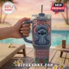 Grey stainless steel 40oz tumbler with a 3D Stitch relief, pink lettering reading Stitch and Ohana Means Family on a deck.!