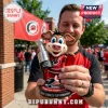 Carolina Hurricanes mascot bobblehead holding a 2026 Stanley Cup replica trophy on a branded circular display base.!