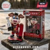 Carolina Hurricanes mascot vinyl figure holding a silver Stanley Cup trophy on a base marked 2026 Stanley Cup Champions.!