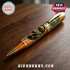 Michelangelo Teenage Mutant Ninja Turtles pen with orange and green shell pattern, gold hardware, on wooden surface.!