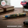 Leonardo Teenage Mutant Ninja Turtles metal pen with gold accents, blue trim, and shell-patterned barrel on a wooden desk.!