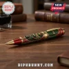 Raphael Teenage Mutant Ninja Turtles ballpoint pen with gold accents, red and green hexagonal pattern on wooden desk.!