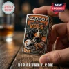 Zippo metal lighter featuring a Tennessee Vols bluetick coonhound, football helmet, and orange checkerboard pattern.!