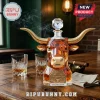 Faceted amber glass longhorn bull decanter with metallic horns, a crystal stopper, and 133rd anniversary commemorative plate.!