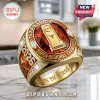 Texas Longhorns 2026 baseball championship ring in gold with a large red center stone and NCAA trophy emblem.!