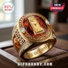 Texas Longhorns 2026 Super Regional Champions gold ring with a large orange gemstone, NCAA trophy emblem, and side diamonds.!