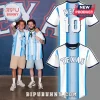 Two men wearing white and light blue vertical striped Texas baseball jerseys with navy trim and the word Texas in blue.!