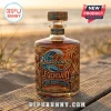 The Beach Boys 65th anniversary commemorative glass whiskey bottle with surf and musical embossing on a beach boardwalk.!