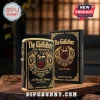 The Godfather 55th anniversary gold-trimmed black metal lighter with marionette and red rose graphic on wooden surface.!