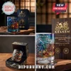 The Kraken Black Spiced Rum collector glass with embossed octopus design and wooden presentation box on wood surface.!