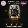Kraken Black Spiced Rum branded stemless glass with black octopus graphic and gold laurel wreath design on black background.!