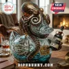 Clear glass duck-shaped decanter with metallic bronze octopus wrapped around it, holding a mini bottle of Kraken Black Rum.!