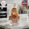 Princess Zelda glass decanter bust with Triforce emblem and 40th anniversary text on a marble kitchen countertop.!
