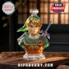 Crystal bust of Link from The Legend of Zelda with amber liquid, engraved 40th anniversary 1986-2026 text on wooden table.!