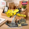 Rocketeer brick construction set with yellow NR77V plane, display stand, and 35th anniversary plaque on wooden desk.!