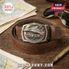 Top Gun 40th anniversary belt with brown leather strap, silver fighter jet buckle, and engraved movie logo details.!