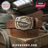 Top Gun 40th anniversary belt with brown leather strap and metallic buckle featuring an F-14 fighter jet engraving.!