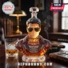 Facet-cut crystal whiskey decanter shaped as a male aviator wearing sunglasses with Top Gun 50th Anniversary text engraved.!