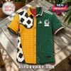 Short-sleeve button-up shirt featuring a split design with a yellow grid and cow-print side and a green Aztec pattern side.!