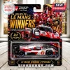 Toyota GR010 Hybrid number 7 die-cast car on Le Mans winners blister card featuring red, white, and black racing graphics.!