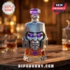 Megatron Transformers 40th Anniversary glass liquor decanter with purple glowing eyes and a matching crystal stopper.!