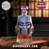 Megatron Transformers 40th anniversary glass whiskey bottle with purple glowing eyes and silver helmet design on wood base.!